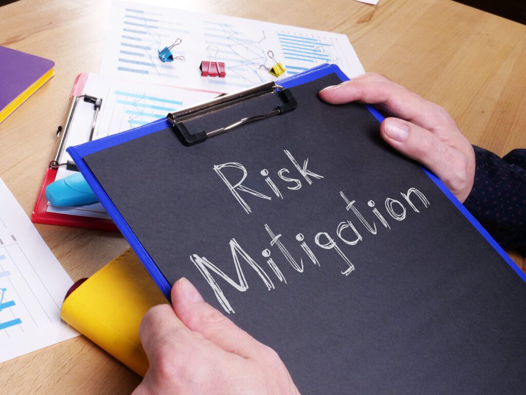 Risk Mitigation is shown on a conceptual photo using the text